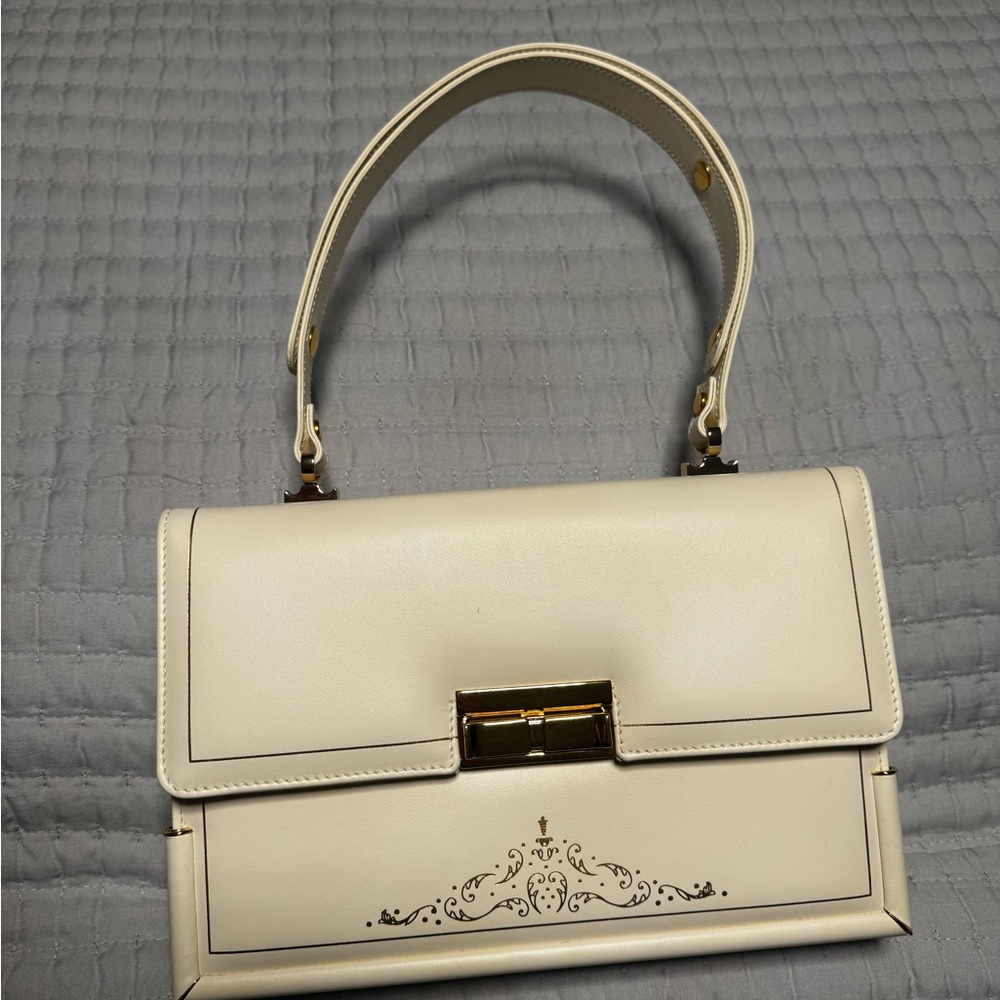 Elegant Cream Shoulder Bag with Gold Detailing